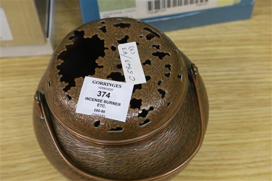 A Japanese incense burner and two items of metalware